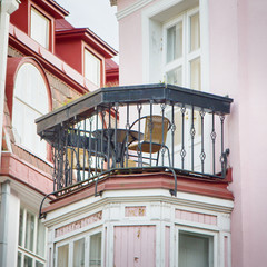 balcony of the house with table and chairs