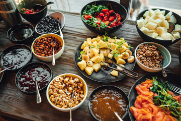 Brunch table in coffee shop, delicious food, Breakfast or brunch table filled with all sorts of delicious food