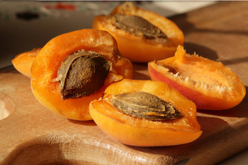 Still life with apricots and a jug