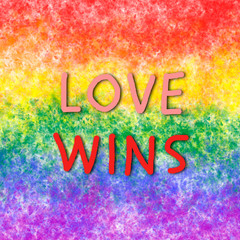 Digitally generated sign with tag love wins on lgbt rainbow colored background
