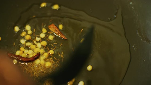 Slow Motion shot of a Indian Mix Vegetable Dish being prepared. 