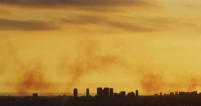 Slow motion of smoke from thunderbirds fly over Hollywood in Los Angeles, California. 