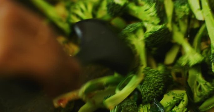 Slow motion shot of cooking a simple and easy vegetarian curry.