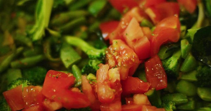 Slow motion shot of cooking a simple and easy vegetarian curry.