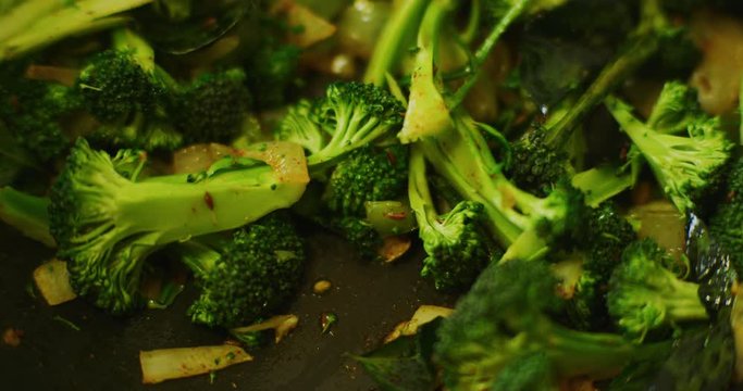Slow motion shot of cooking a simple and easy vegetarian curry.