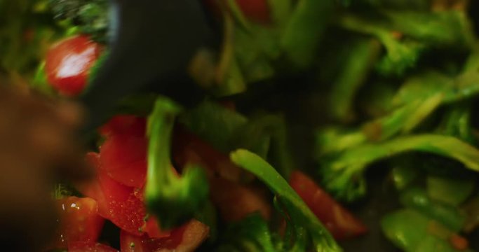 Slow motion shot of cooking a simple and easy vegetarian curry.