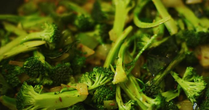 Slow motion shot of cooking a simple and easy vegetarian curry.