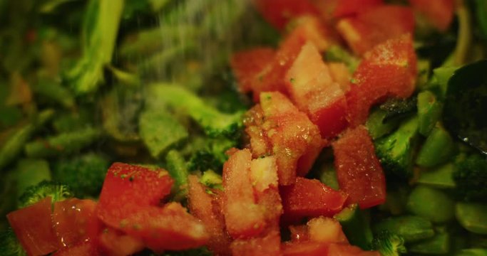 Slow motion shot of cooking a simple and easy vegetarian curry.