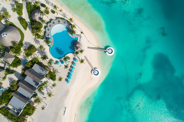 Aerial view of beautiful island at Maldives in the Indian Ocean. Top view from drone.