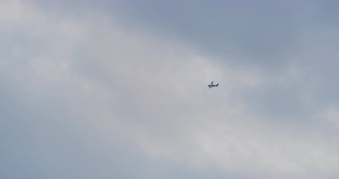 Slow motion of News Helicopters waiting for thunderbirds to fly over Hollywood. Los Angeles, California