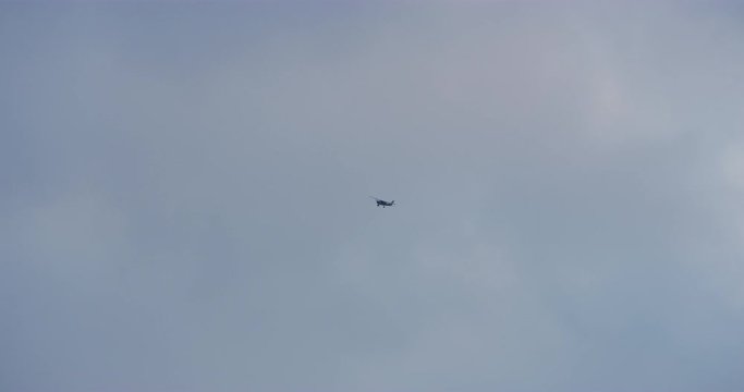 Slow motion of News Helicopters waiting for thunderbirds to fly over Hollywood. Los Angeles, California