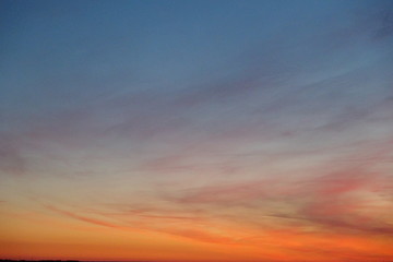 Fototapeta na wymiar Sunset sky white clouds Sweden summer