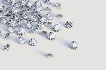 Round cut diamonds scattered on white background
