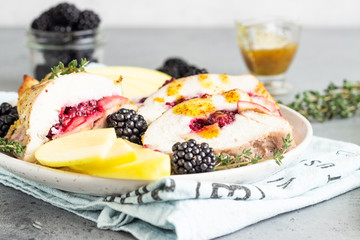 Baked turkey or chicken breast stuffed with apples and blackberries.