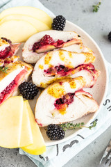 Baked turkey or chicken breast stuffed with apples and blackberries.