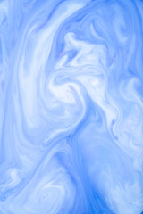 Obraz premium Abstract colored background, fluid design. Stains of paint on the water. Ebru art, marbled paper.