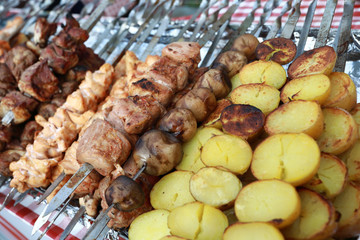 Meat and potato kebabs on skewers