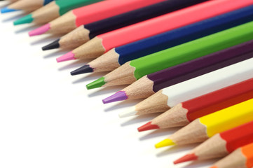 Color pencils isolated on white background. Close up. selective focus.