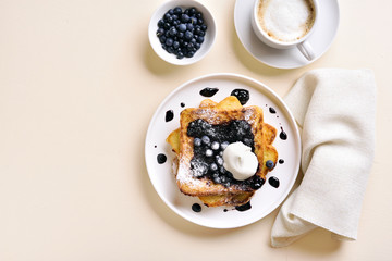 French toasts with blueberry sauce