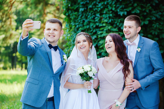 bride and groom take a selfie
