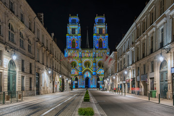 Joanna of Arc street that flows into the Church of the Holy Cross in Orleans, France. Illuminated...