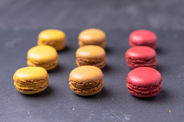 Different types of colourful macaroons in close up, Sweet and colourful french macaroons.