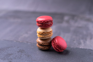 Different types of colourful macaroons in close up, Sweet and colourful french macaroons.
