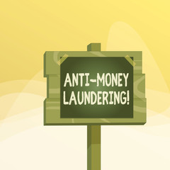 Writing note showing Anti Money Laundering. Business concept for regulations stop generating income through illegal actions Wood plank wood stick pole paper note attached adhesive tape
