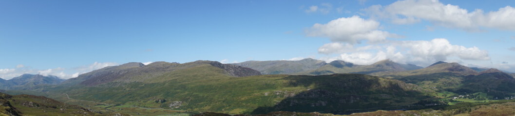 Fototapeta premium High Mountain Range with Brilliant Blue Sky and Clouds - Wales UK