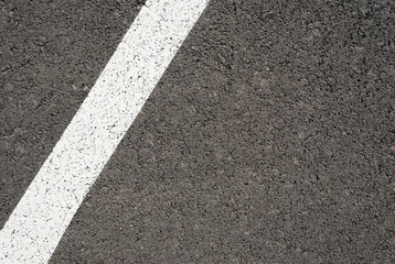 New asphalt texture with white line. Top view