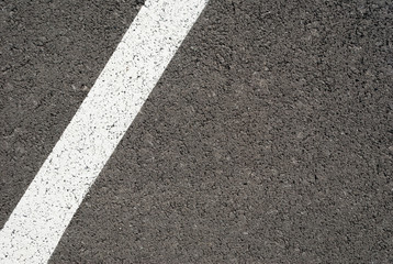 Fototapeta premium New asphalt texture with white line. Top view