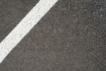 Fototapeta premium New asphalt texture with white line. Top view