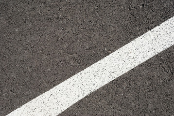 New asphalt texture with white line. Top view