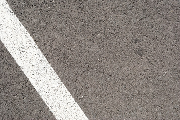 New asphalt texture with white line. Top view