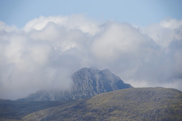 Mountain Range Covered in Clouds