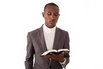 portrait of young man with book in hand