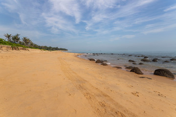 Fototapeta na wymiar Haikou beach and sea, palms Hainan, China