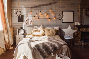 Cosy bedroom with eco decor. Wood and nature concept in interior of room. Scandinavian interior,...
