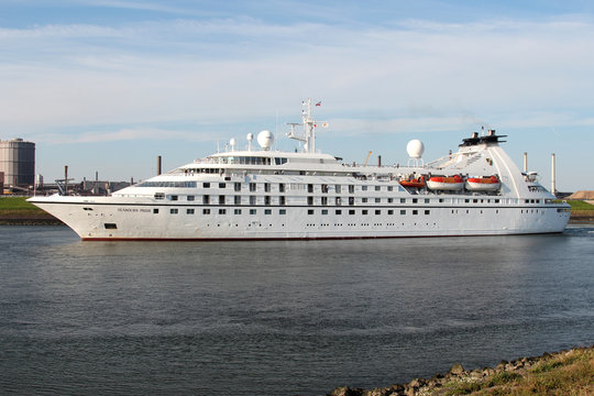 IJMUIDEN, THE NETHERLANDS - August 12, 2012: SEABOURN PRIDE leaving the sluice of IJmuiden. Seabourn Cruise Line is an ultra-luxury cruise line headquartered in Seattle, Washington.