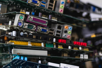 Closeup shot of computer mainboards laying on top of each other