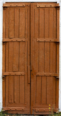 Tall wooden doors as background and texture