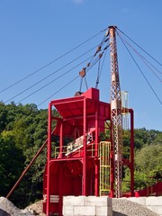 A red crane for gravel distribution
