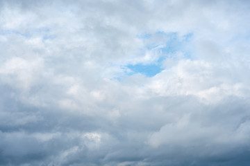                           Cloudy sky with a part of clear blue sky. Natural background.     