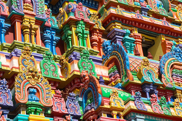 Fototapeta na wymiar Beautiful Hindu Temple Tower with Colorful Statues