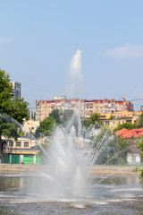 City fountain, nature landscape summer day.