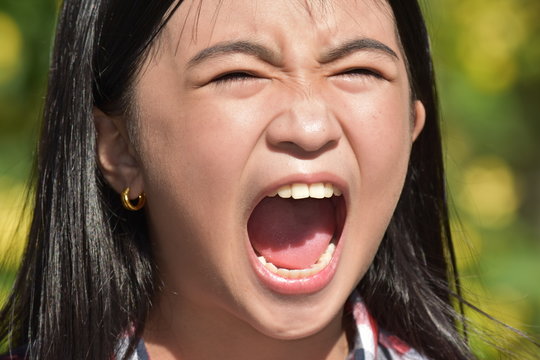 A Stressed Petite Filipina Girl Child