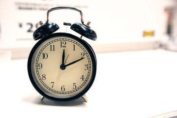 old vintage alarm clock on white background