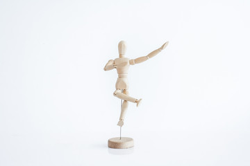 wooden dummy with a glass