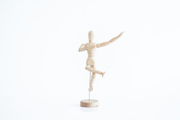 wooden dummy with a glass