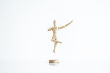 wooden dummy with a glass